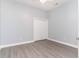 Neutral bedroom featuring plank flooring and a ceiling fan at 197 Northside Dr., Little River, SC 29566