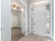 Inviting foyer with tile flooring, an arched door, and views into the adjacent room at 197 Northside Dr., Little River, SC 29566