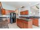 Spacious kitchen featuring dark granite countertops, island and stainless steel appliances at 197 Northside Dr., Little River, SC 29566