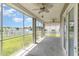 Spacious screened porch with beautiful views of the pond at 197 Northside Dr., Little River, SC 29566