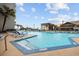 Resort-style outdoor pool with lounge chairs for relaxation and a staircase at 200 76Th Ave. N # 1009, Myrtle Beach, SC 29572