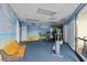 Workout room featuring murals, bench, and exercise equipment at 200 76Th Ave. N # 1009, Myrtle Beach, SC 29572