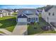Aerial view of a lovely home with manicured lawn in a desirable neighborhood with a community pool at 2005 Tiller Ct., Myrtle Beach, SC 29579