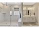 Modern bathroom featuring a glass-enclosed shower and double vanity sinks at 2005 Tiller Ct., Myrtle Beach, SC 29579