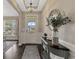 Bright foyer with elegant lighting, hardwood floors, and decorative accents at 2005 Tiller Ct., Myrtle Beach, SC 29579