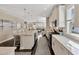 Bright, open kitchen with a large island, modern appliances, and seamless flow into the living area at 2005 Tiller Ct., Myrtle Beach, SC 29579