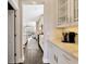 Modern kitchen with white cabinetry, marble countertops, and stainless steel appliances at 2005 Tiller Ct., Myrtle Beach, SC 29579