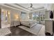 Main bedroom features a tray ceiling, ceiling fan, and plenty of natural light at 2005 Tiller Ct., Myrtle Beach, SC 29579