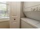 Convenient laundry area with modern washer and dryer, offering efficiency and ease for everyday living at 201 Landing Rd. # D, North Myrtle Beach, SC 29582