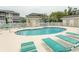 Inviting community pool surrounded by lounge chairs at 201 Landing Rd. # D, North Myrtle Beach, SC 29582