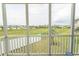 Screened in porch view overlooking green space at 201 Landing Rd. # D, North Myrtle Beach, SC 29582