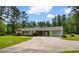 Charming one-story brick home with a well-manicured front yard and an attached carport at 2192 Highway 308, Galivants Ferry, SC 29544
