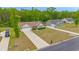 An aerial view of a neighborhood showcasing houses with well-kept lawns and long driveways at 247 Rolling Oak Dr., Georgetown, SC 29440