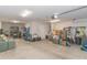 Spacious garage with concrete floor, overhead lighting, and ample storage space at 247 Rolling Oak Dr., Georgetown, SC 29440