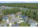 Areal view of new construction homes in a wooded area with cul-de-sacs and ample green space at 2615 Painted Trillium Ct., Myrtle Beach, SC 29579