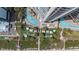 Top-down shot showcasing pools, lawns, lounge chairs, and umbrellas at an oceanfront condominium at 2701 N Ocean Blvd. # 561/563, Myrtle Beach, SC 29577