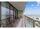 Balcony with chairs overlooking ocean, beach and pool at 2701 N Ocean Blvd. # 561/563, Myrtle Beach, SC 29577