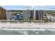 Beautiful beach view of buildings and ocean on a sunny day with clear skies and crashing waves at 2701 N Ocean Blvd. # 561/563, Myrtle Beach, SC 29577