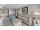 Comfortable living area with sofa, chair, coffee table, and side tables providing ample space at 2701 N Ocean Blvd. # 561/563, Myrtle Beach, SC 29577