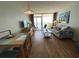 Bright living room with ocean view, featuring dining area, and comfortable seating arrangement at 2701 S Ocean Blvd. # 1507, North Myrtle Beach, SC 29582