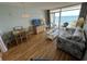 An ocean view from a quaint living room with dining table and comfortable seating arrangement at 2701 S Ocean Blvd. # 1507, North Myrtle Beach, SC 29582