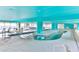 Indoor pool with overhead lighting and many lounge chairs available at 2701 S Ocean Blvd. # 1507, North Myrtle Beach, SC 29582