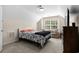 Inviting bedroom with sloped ceilings, cozy seating, and plenty of natural light at 320 Saint Catherine Bay Ct., Surfside Beach, SC 29575