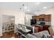 Well-equipped kitchen featuring granite countertops, stainless steel appliances, and a breakfast bar at 320 Saint Catherine Bay Ct., Surfside Beach, SC 29575