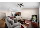 Spacious living room with modern decor, high ceilings, and hardwood flooring throughout at 320 Saint Catherine Bay Ct., Surfside Beach, SC 29575