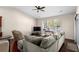 Comfortable living room featuring vaulted ceilings, large windows, and plush seating at 320 Saint Catherine Bay Ct., Surfside Beach, SC 29575