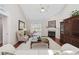 Bright living room with vaulted ceiling, fireplace, and hardwood floors at 3224 Hermitage Dr., Little River, SC 29566