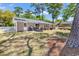 Charming backyard with patio area, grill, and white picket fence, perfect for outdoor entertaining at 333 14Th Ave. S, Surfside Beach, SC 29575