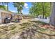 Generous backyard with seating area and grill, surrounded by a charming white picket fence at 333 14Th Ave. S, Surfside Beach, SC 29575