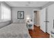 Cozy bedroom with a bed, and nightstand, complete with hardwood floors at 333 14Th Ave. S, Surfside Beach, SC 29575