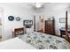 Bright bedroom with a bed and desk and a view to an adjoining room at 333 14Th Ave. S, Surfside Beach, SC 29575