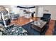 Open floor plan featuring a modern kitchen with an island and a comfortable living space at 333 14Th Ave. S, Surfside Beach, SC 29575