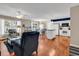 Bright open-concept living space with hardwood floors, a ceiling fan, and an eat-in kitchen at 333 14Th Ave. S, Surfside Beach, SC 29575