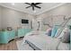 Comfortable bedroom with teal dresser, plush pillows, white faux fur rug, and a nautical theme at 355 Oak Ave., Murrells Inlet, SC 29576