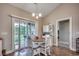 Cozy dining area featuring an outdoor view, complemented by a charming round table and comfortable seating at 377 Copperwood Loop, Conway, SC 29526