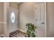 Bright entryway featuring a decorative glass front door and wood-look flooring, creating a warm welcome at 377 Copperwood Loop, Conway, SC 29526
