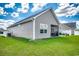 Beautiful exterior with large yard and a screened-in porch at 377 Copperwood Loop, Conway, SC 29526