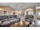 Open-concept living area showcasing stylish sofas and seamless flow into the kitchen, ideal for entertaining at 377 Copperwood Loop, Conway, SC 29526