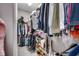 Large walk-in closet with generous storage solutions for clothing, shoes, and accessories at 377 Copperwood Loop, Conway, SC 29526