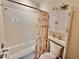 Bright bathroom with a flamingo-themed shower curtain and built-in storage at 421 Appledore Circle # 5-D, Myrtle Beach, SC 29572