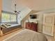 Light-filled bedroom with two beds, a ceiling fan, and ample natural light at 421 Appledore Circle # 5-D, Myrtle Beach, SC 29572