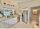 Kitchen featuring stainless steel appliances, granite countertops, and views to the living area at 421 Appledore Circle # 5-D, Myrtle Beach, SC 29572