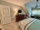 Comfortable main bedroom with a TV, dresser, and a view of the window at 421 Appledore Circle # 5-D, Myrtle Beach, SC 29572