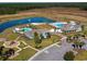 A beautiful community with a pool, clubhouse, and scenic water feature, perfect for relaxation and recreation at 4344 Falls Oaks St., Myrtle Beach, SC 29579