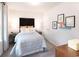 Inviting bedroom featuring a comfortable bed with decorative pillows and a stylish bedside table with lamps at 4344 Falls Oaks St., Myrtle Beach, SC 29579