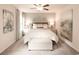 Calm main bedroom with a neutral color scheme, large bed, and decorative artwork at 4344 Falls Oaks St., Myrtle Beach, SC 29579